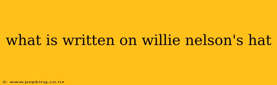 what is written on willie nelson's hat